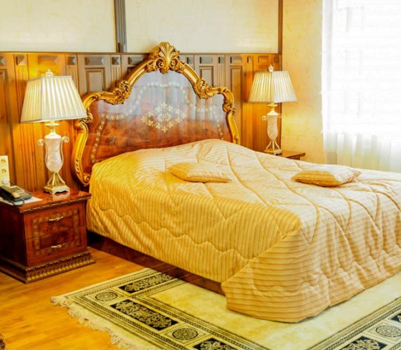 Интерьер спальни в 2 местном 2 комнатном Стандарте семейный санатория Вилла Арнест в Кисловодске
